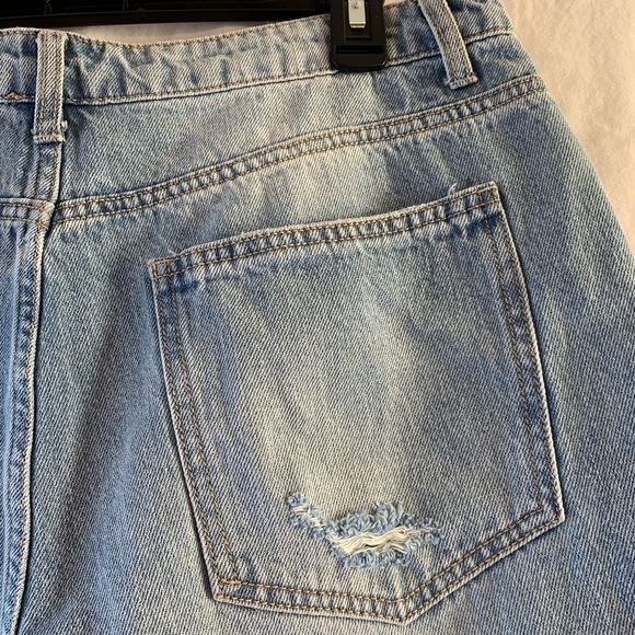 Blue ripped jeans - Picture 11 of 12